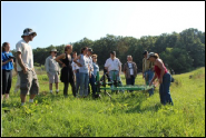 a photo of people in a farm tour