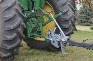 A hitch connected to a tractor with an Agri-Speed Hitch connecting them