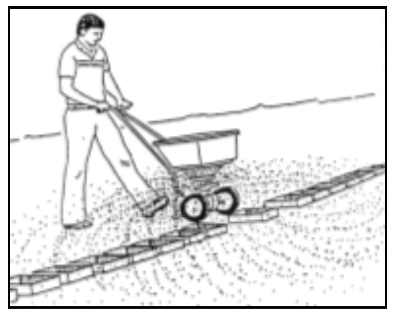 Cartoon of a man using a spreader