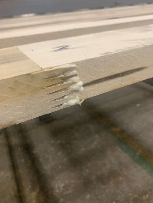 Two pieces of lumber connected with a finger joint
