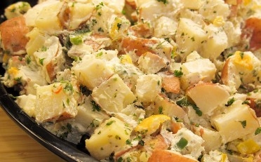 a photo of potato salad on a plate
