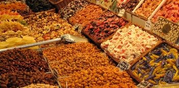 Photo of dried fruits and vegetables displayed at a market