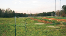 a photo of a farm with Electric fencing