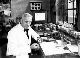 a black and white photo of Alexander Fleming