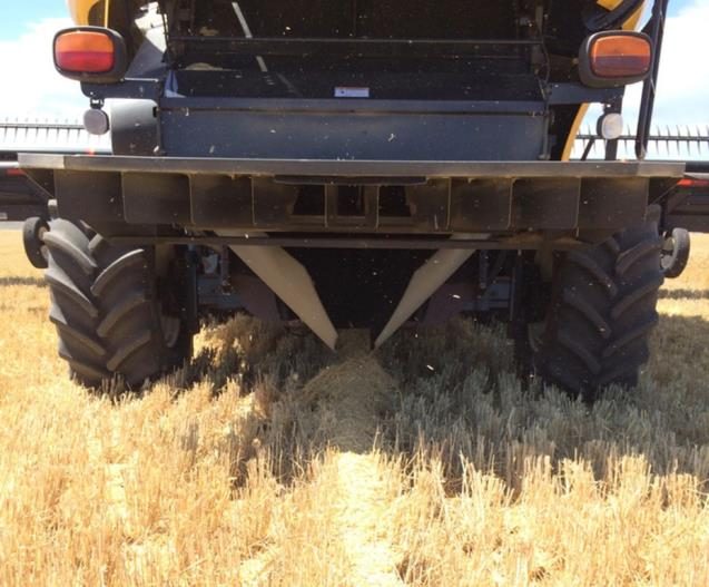 The $200 plastic chute fitted to the harvester funnels the chaff containing the majority of weed seeds present into a narrow band in the middle of the CTF run.