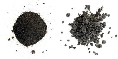 A top view of two piles of poultry litter ash. One pile is a powder, the other is granulated into prills.