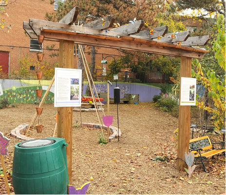 A school garden area with a pagota in the forefront.