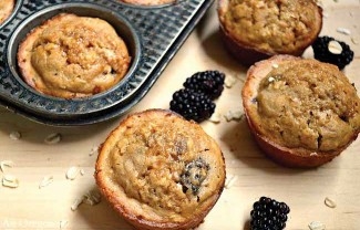 Muffins with baked-in blackberries.